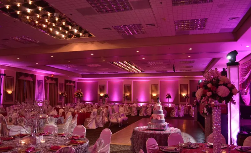 Ballroom washed in pink uplighting